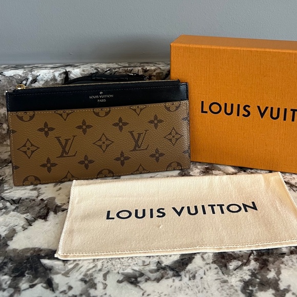 Louis Vuitton Slim Purse M. Rev. - Picture 1 of 7